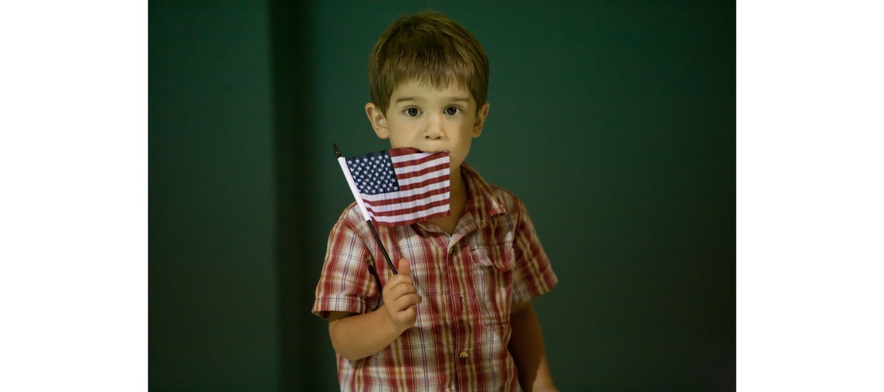 child with an american flag